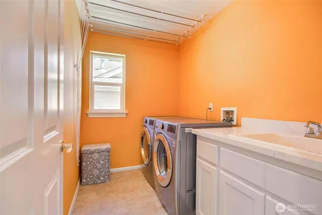 a view of a wooden door and a window