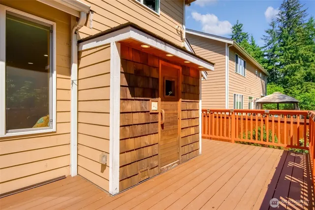 a view of a door with wooden fencing