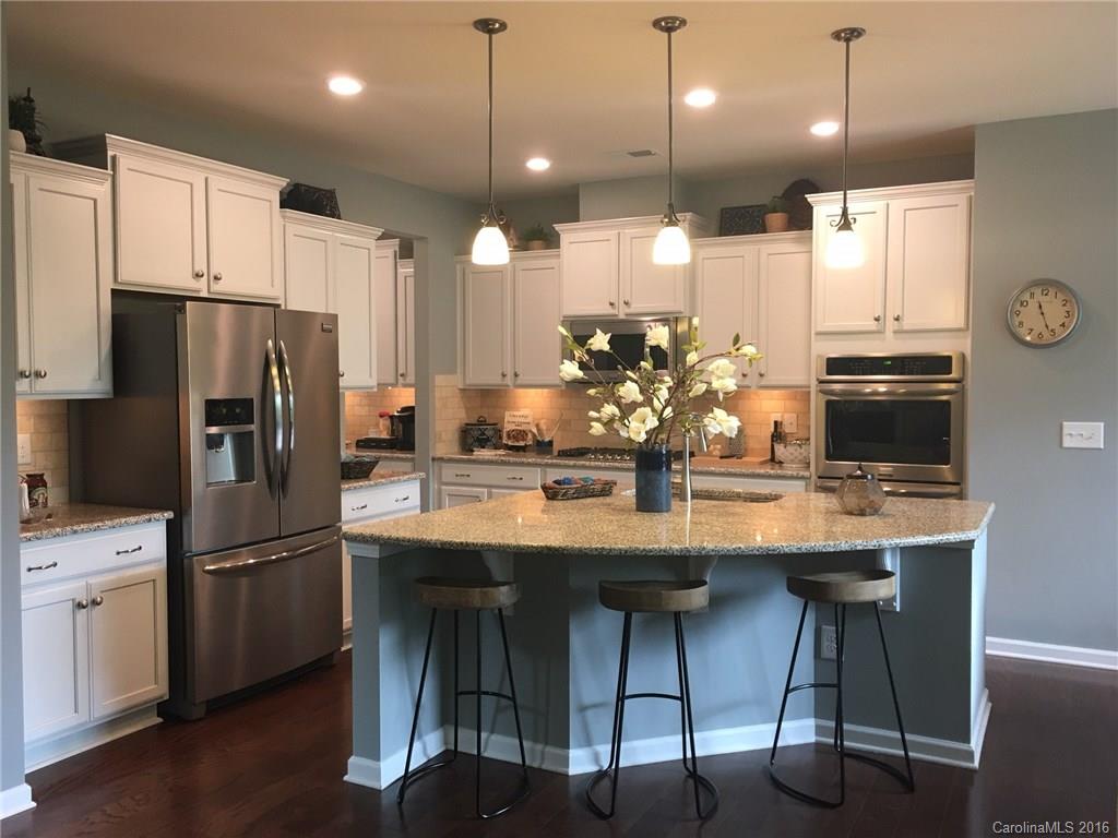 1010 Currituck Way, Unit 67 York, SC 29745 - Photo 2 of 24 a kitchen with cabinets and stainless steel appliances