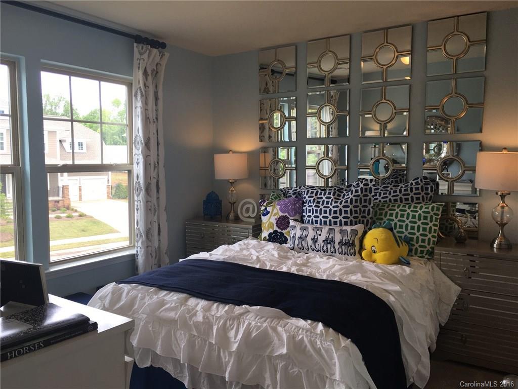 1010 Currituck Way, Unit 67 York, SC 29745 - Photo 11 of 24 a bedroom with a bed and window