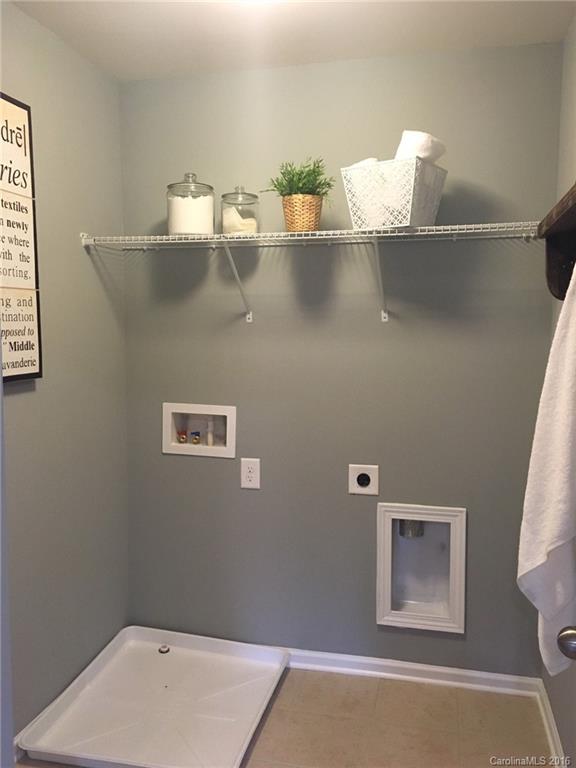 1010 Currituck Way, Unit 67 York, SC 29745 - Photo 14 of 24 a close view of a sink a refrigerator and a window