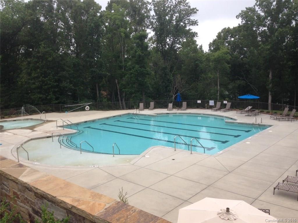 1010 Currituck Way, Unit 67 York, SC 29745 - Photo 21 of 24 a view of a swimming pool with a yard