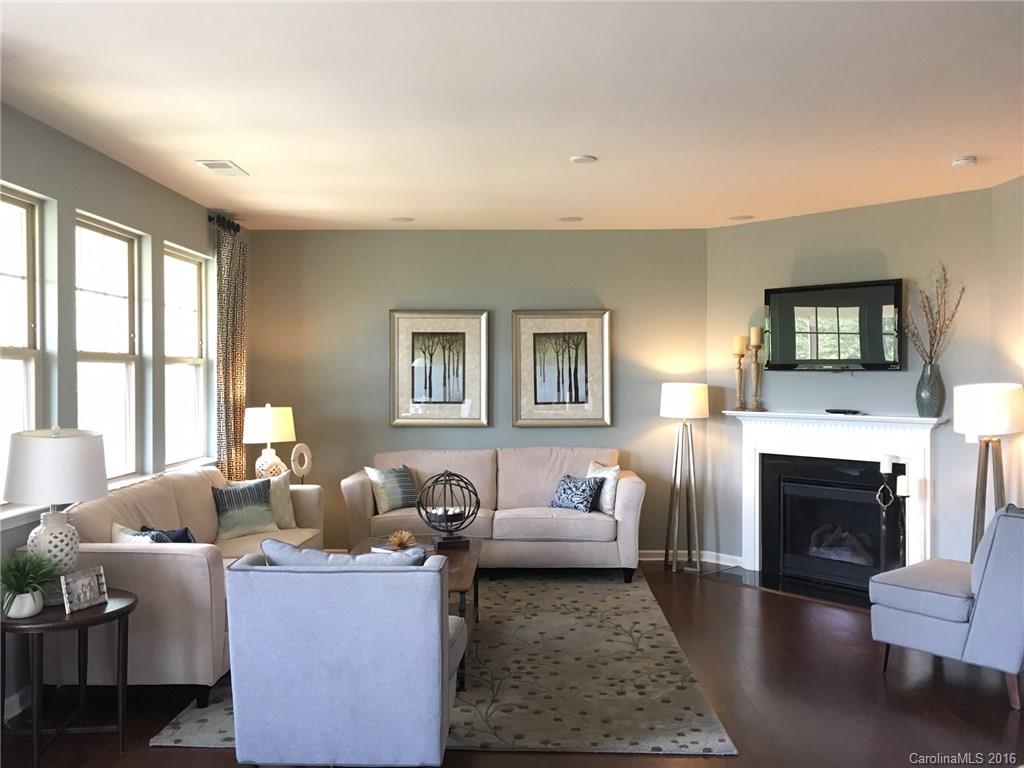 1010 Currituck Way, Unit 67 York, SC 29745 - Photo 5 of 24 a living room with furniture flat screen tv and a fireplace