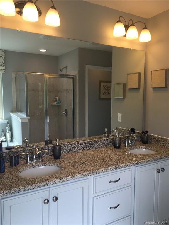 1010 Currituck Way, Unit 67 York, SC 29745 - Photo 8 of 24 a bathroom with sink granite and double vanity