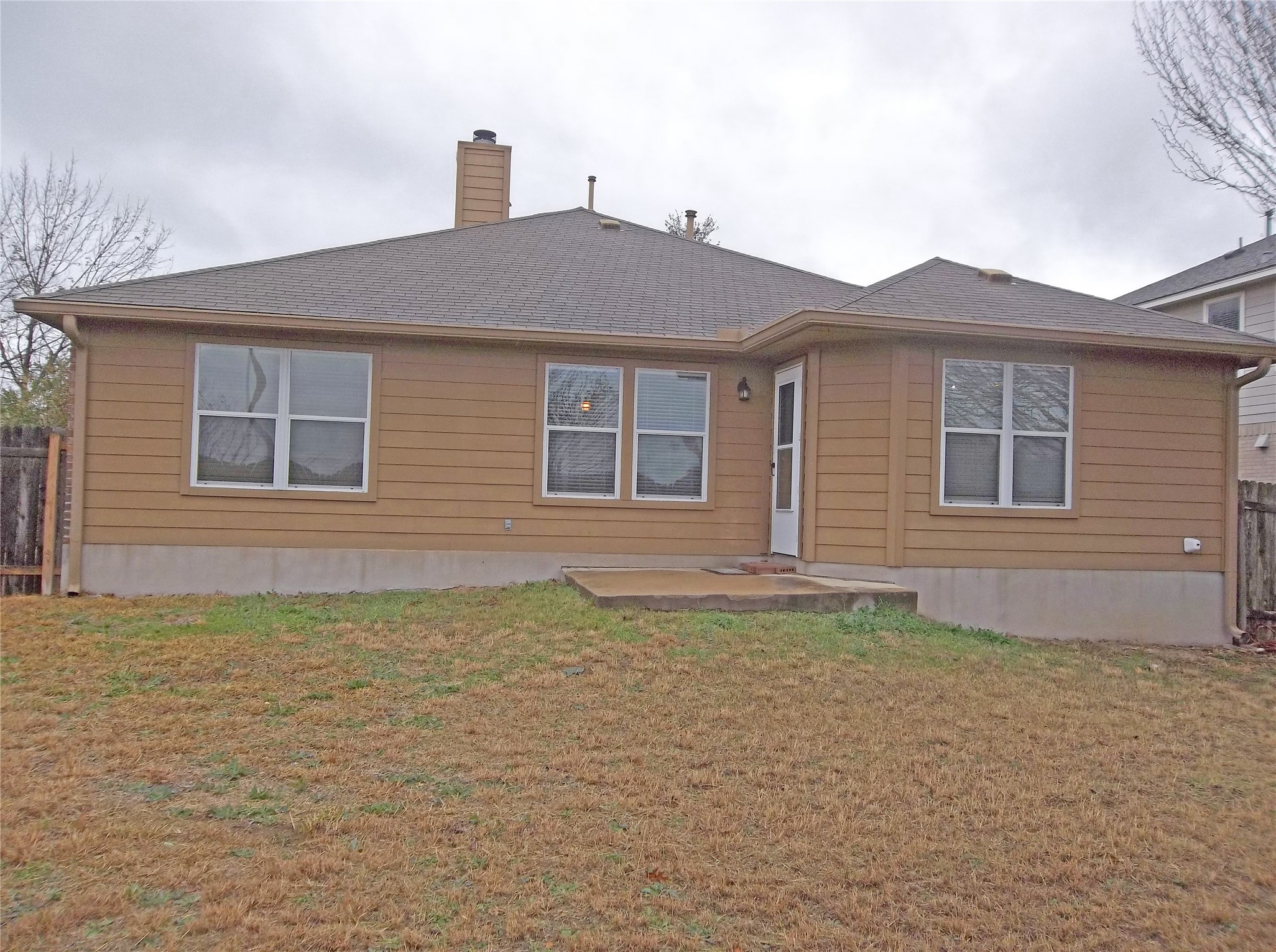 110 Fossil Trail Leander, TX 78641 - Photo 19 of 21 a front view of a house with a yard