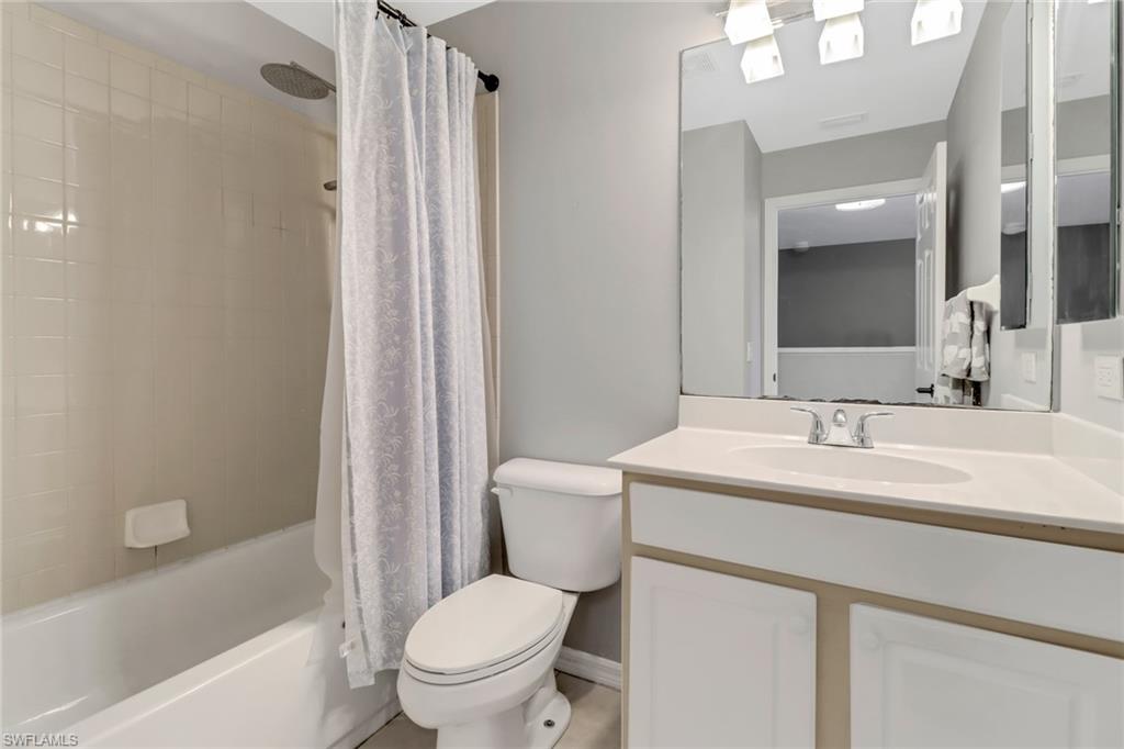20024 Heatherstone Way, Unit 2 Estero, FL 33928 - Photo 21 of 38 a bathroom with a sink toilet and shower