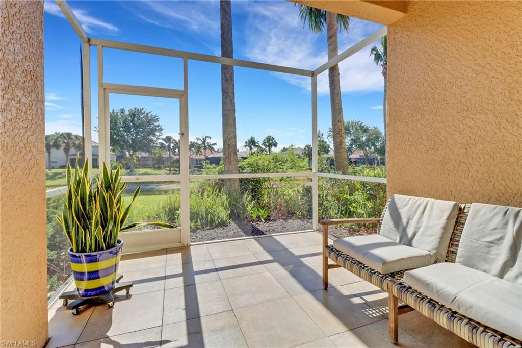 20024 Heatherstone Way, Unit 2 Estero, FL 33928 - Photo 25 of 38 a building outdoor space with patio furniture