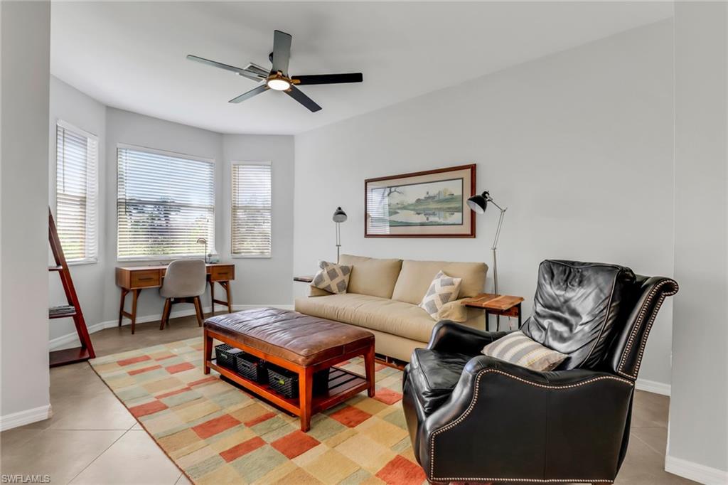 20024 Heatherstone Way, Unit 2 Estero, FL 33928 - Photo 9 of 38 a living room with furniture and a window