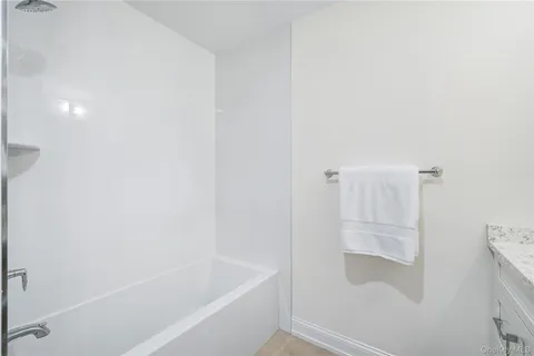 a bathroom with a bathtub