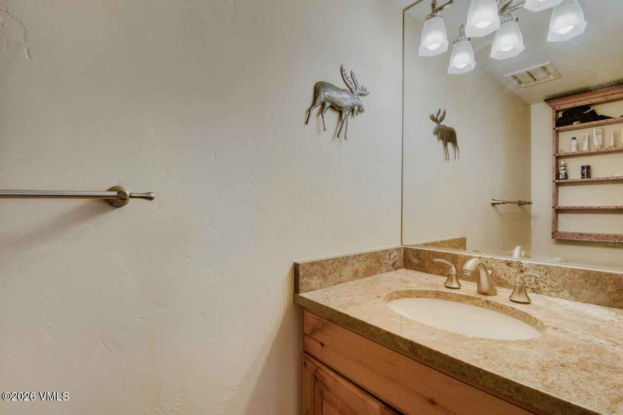 4600 Vail Racquet Club Drive, Unit 4 Vail, CO 81657 - Photo 6 of 15 Powder room en suite from primary
