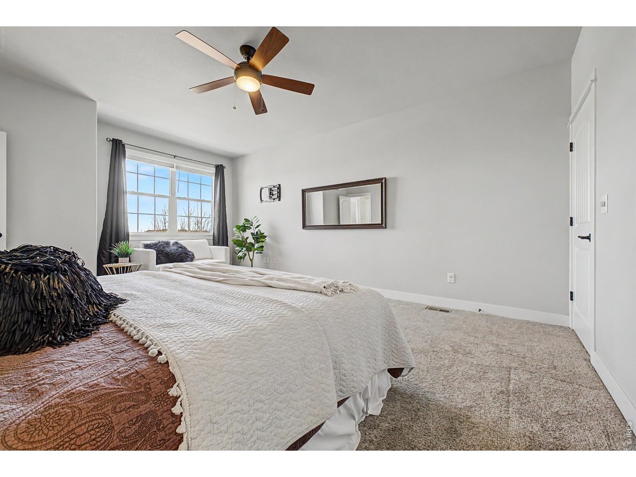 2069 Day Spring Drive Windsor, CO 80550 - Photo 12 of 47 Spacious primary retreat with room to relax and recharge