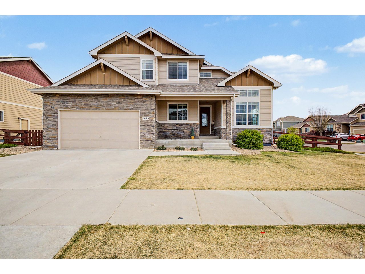 2069 Day Spring Drive Windsor, CO 80550 - Photo 2 of 47 2069 Day Spring Drive, Windsor CO 80550 with 3 car tandem garage and corner lot that the neighbors all adore.