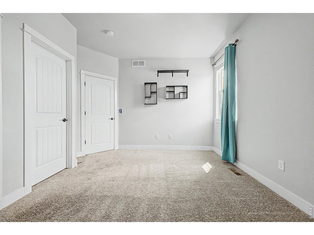 2069 Day Spring Drive Windsor, CO 80550 - Photo 21 of 47 Additional upper level bedroom with generous natural light