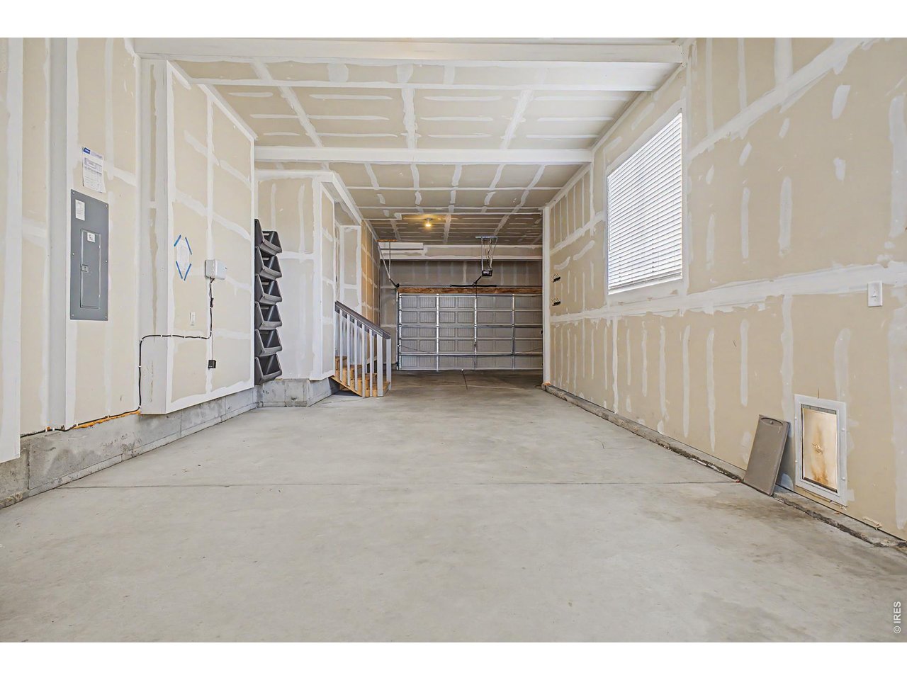 2069 Day Spring Drive Windsor, CO 80550 - Photo 34 of 47 Tandem third garage bay ideal for workshop, storage of bikes /toys/hobbies, tools or golf cart parking