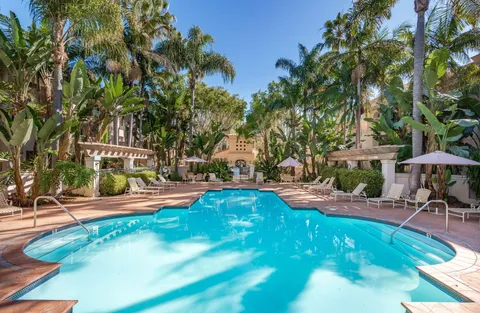 a view of a swimming pool with an outdoor space