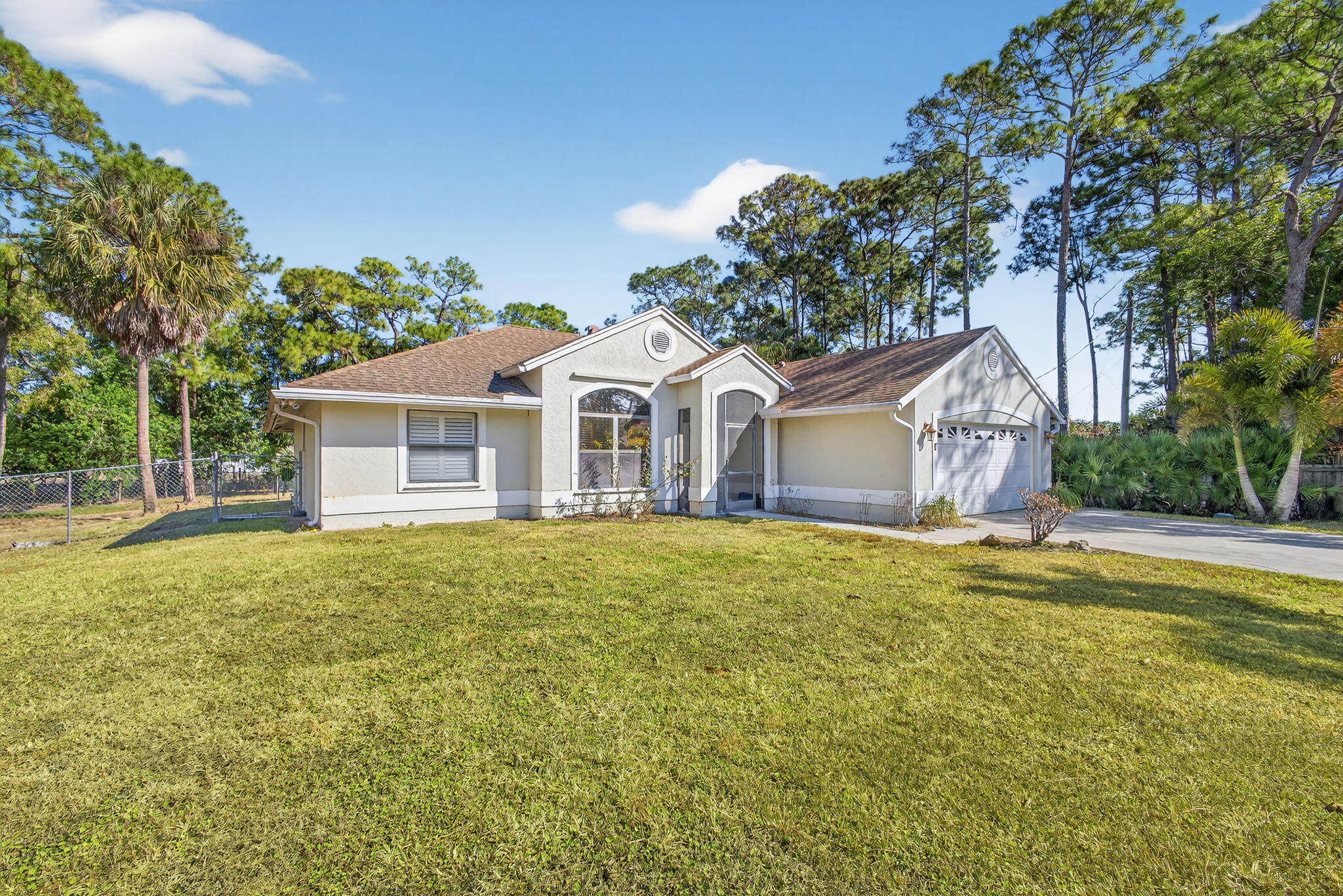14241 76th Road North The Acreage, FL 33470 - Photo 2 of 73 7-web-or-mls-5D1A0177