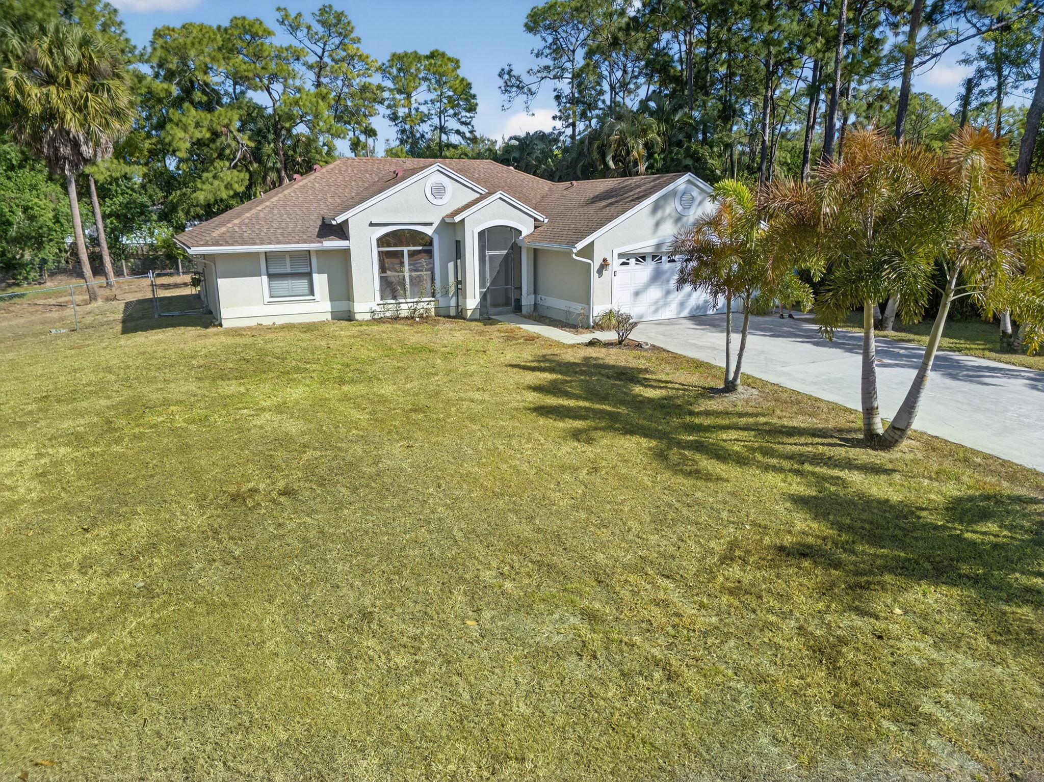 14241 76th Road North The Acreage, FL 33470 - Photo 5 of 73 62-web-or-mls-DJI_20260210104034_0217_D