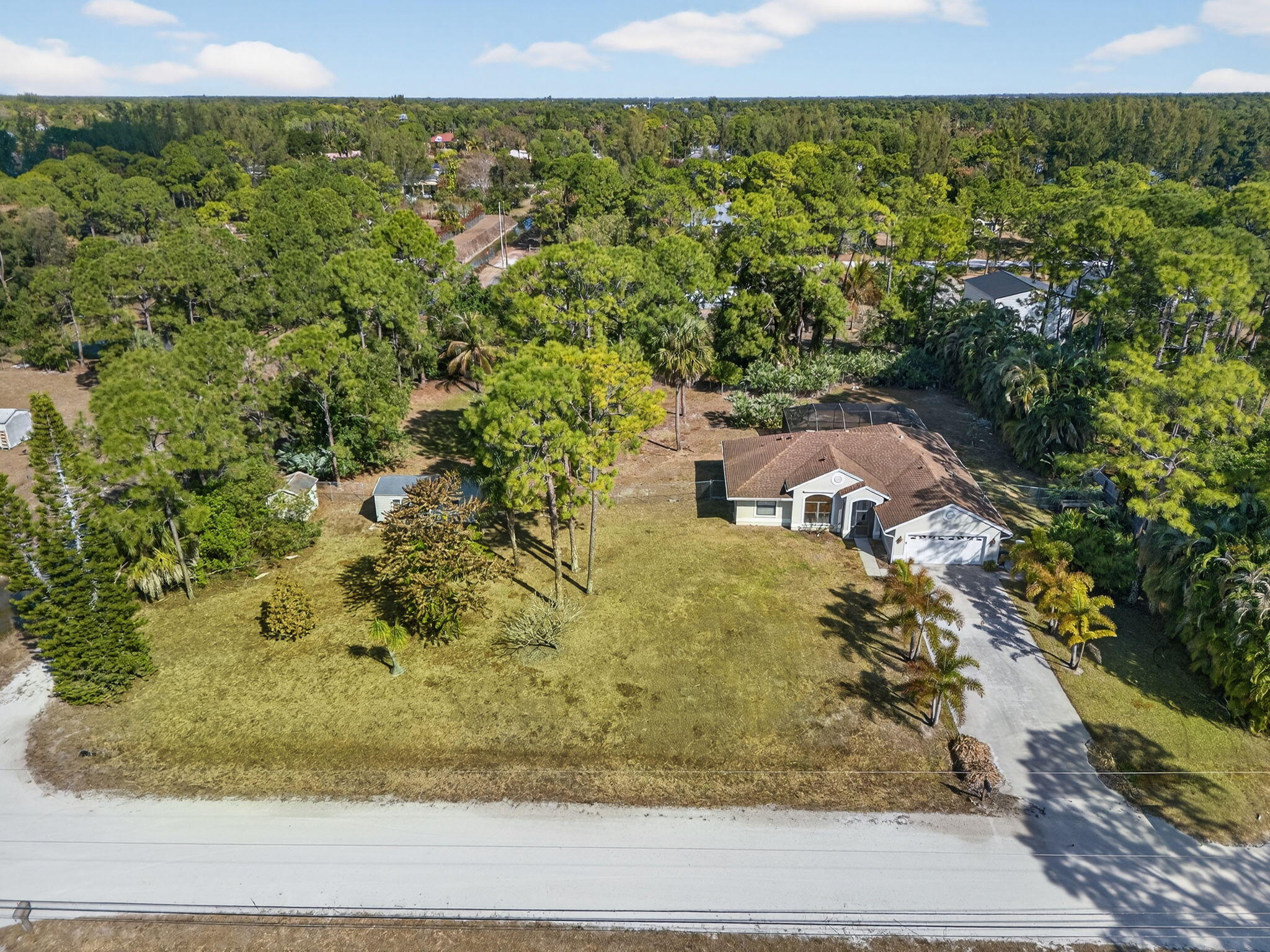14241 76th Road North The Acreage, FL 33470 - Photo 60 of 73 63-web-or-mls-DJI_20260210104049_0221_D
