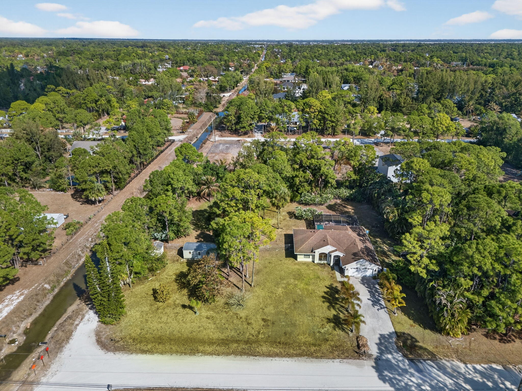 14241 76th Road North The Acreage, FL 33470 - Photo 61 of 73 64-web-or-mls-DJI_20260210104106_0224_D