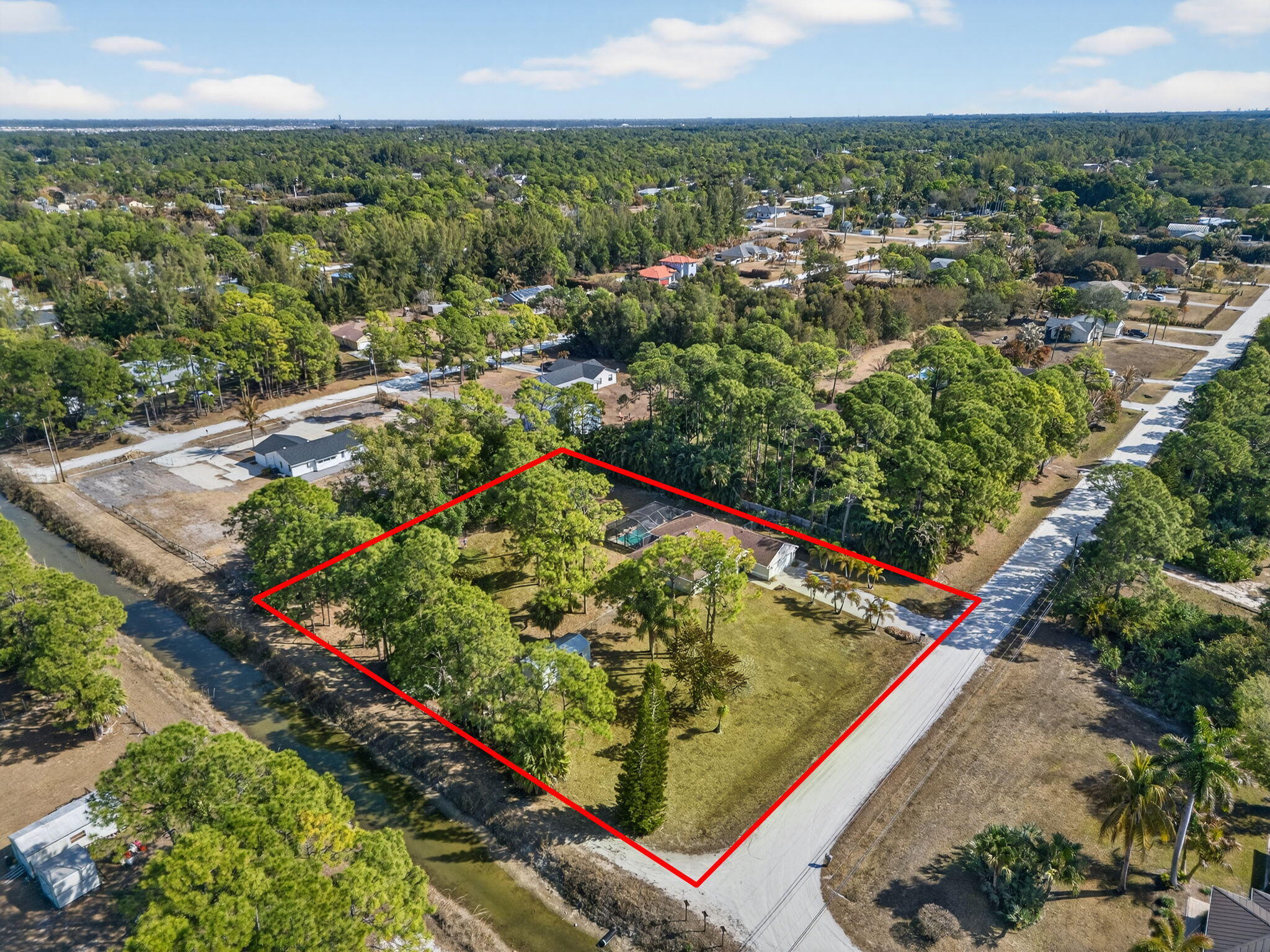 14241 76th Road North The Acreage, FL 33470 - Photo 63 of 73 66-web-or-mls-DJI_20260210104137_0236_D