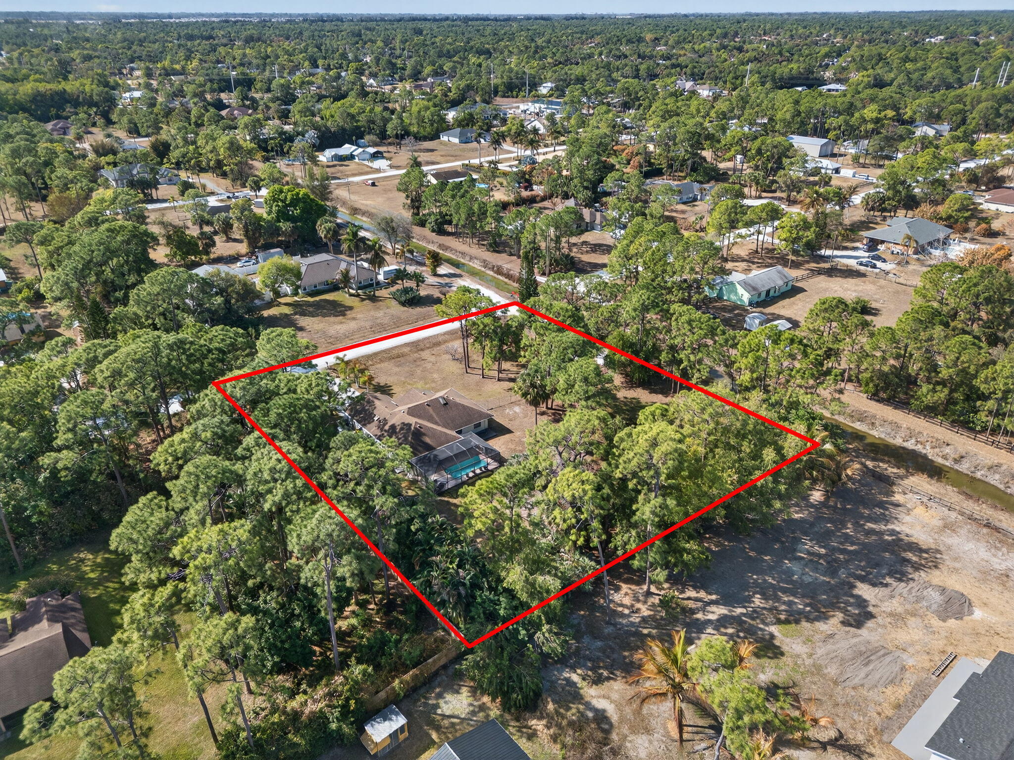 14241 76th Road North The Acreage, FL 33470 - Photo 68 of 73 69-web-or-mls-DJI_20260210104240_0250_D