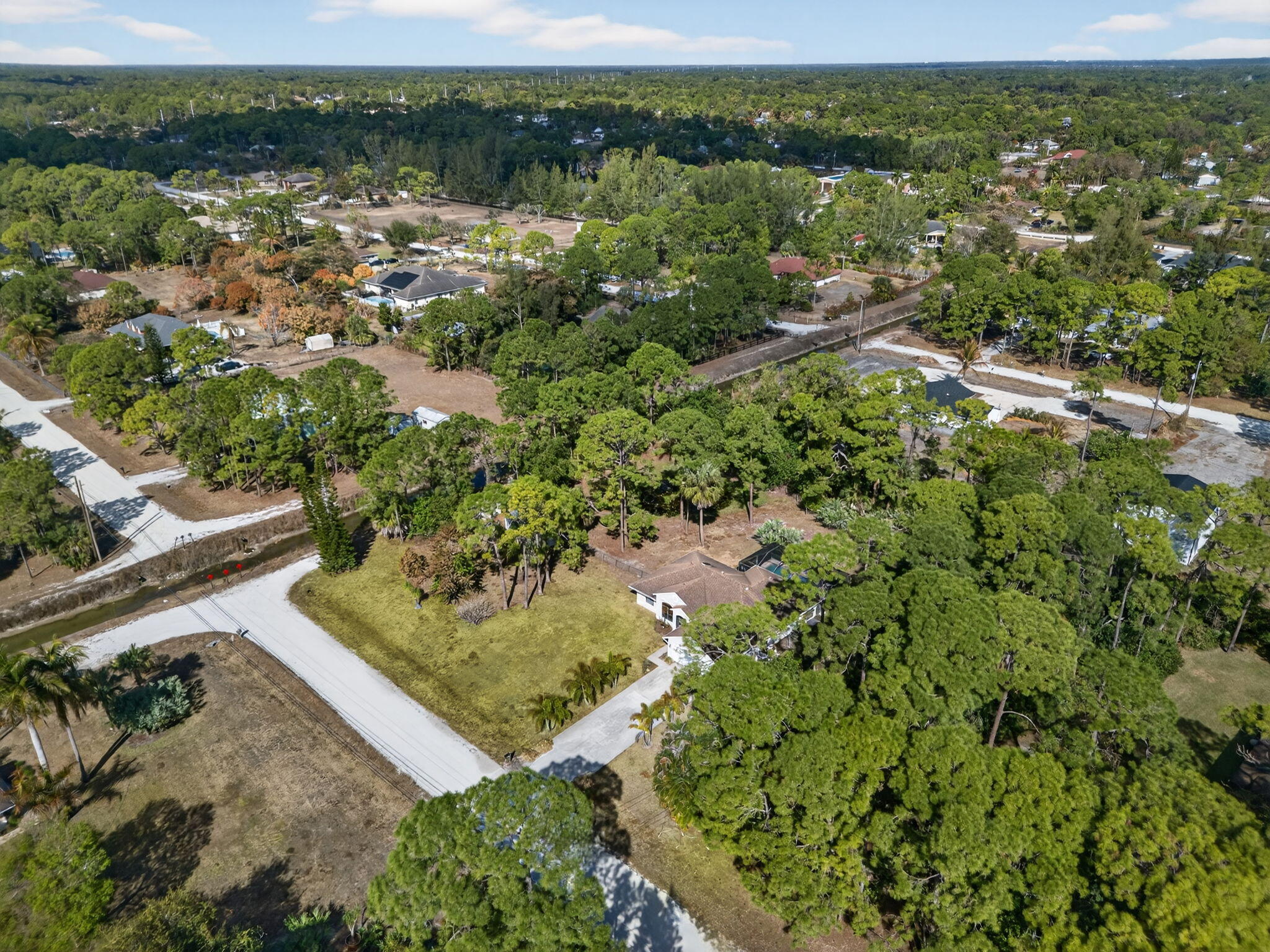 14241 76th Road North The Acreage, FL 33470 - Photo 70 of 73 67-web-or-mls-DJI_20260210104210_0238_D