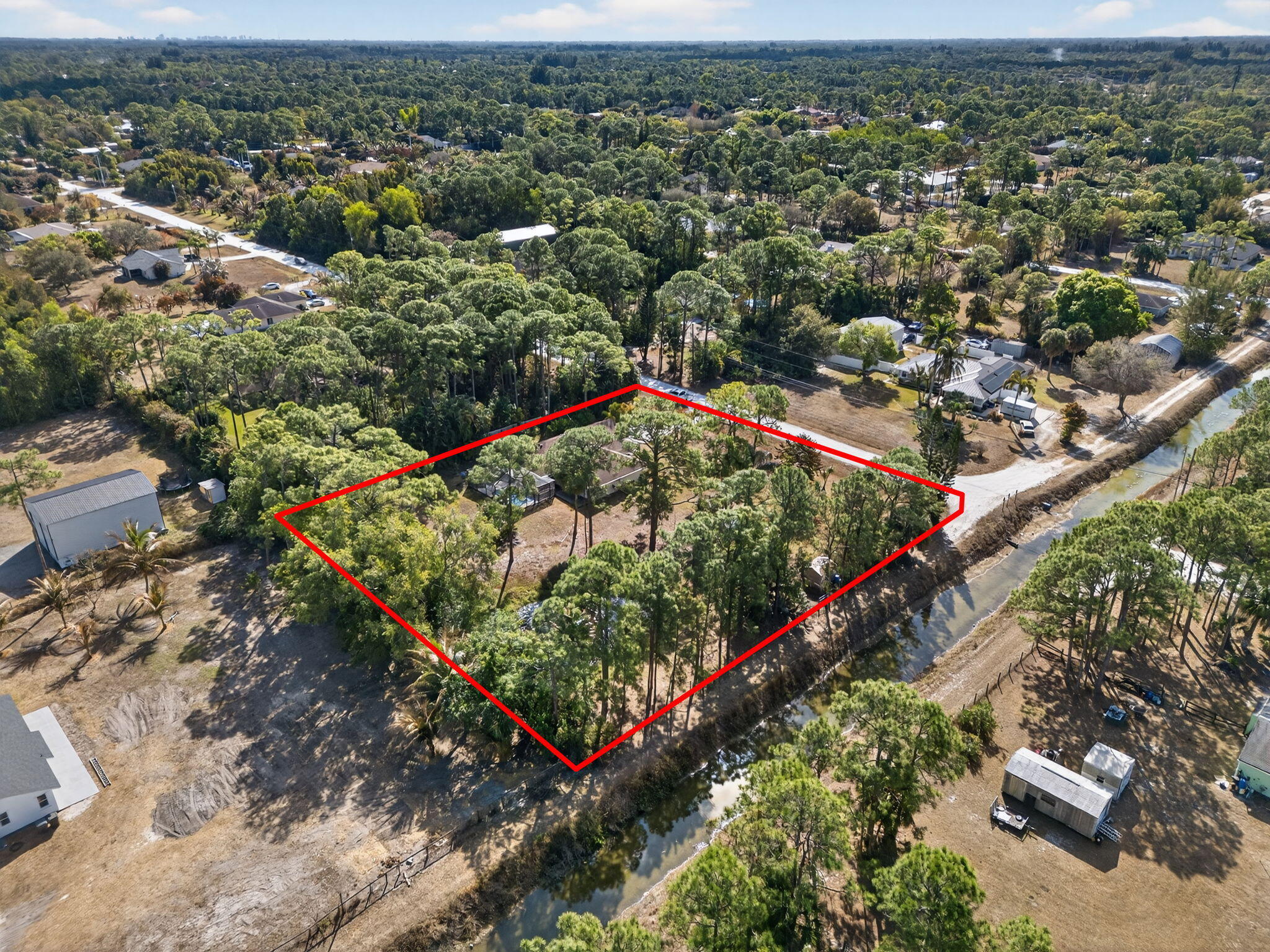 14241 76th Road North The Acreage, FL 33470 - Photo 71 of 73 71-web-or-mls-DJI_20260210104304_0259_D