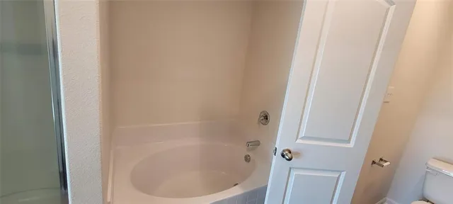 a bathroom with a bathtub