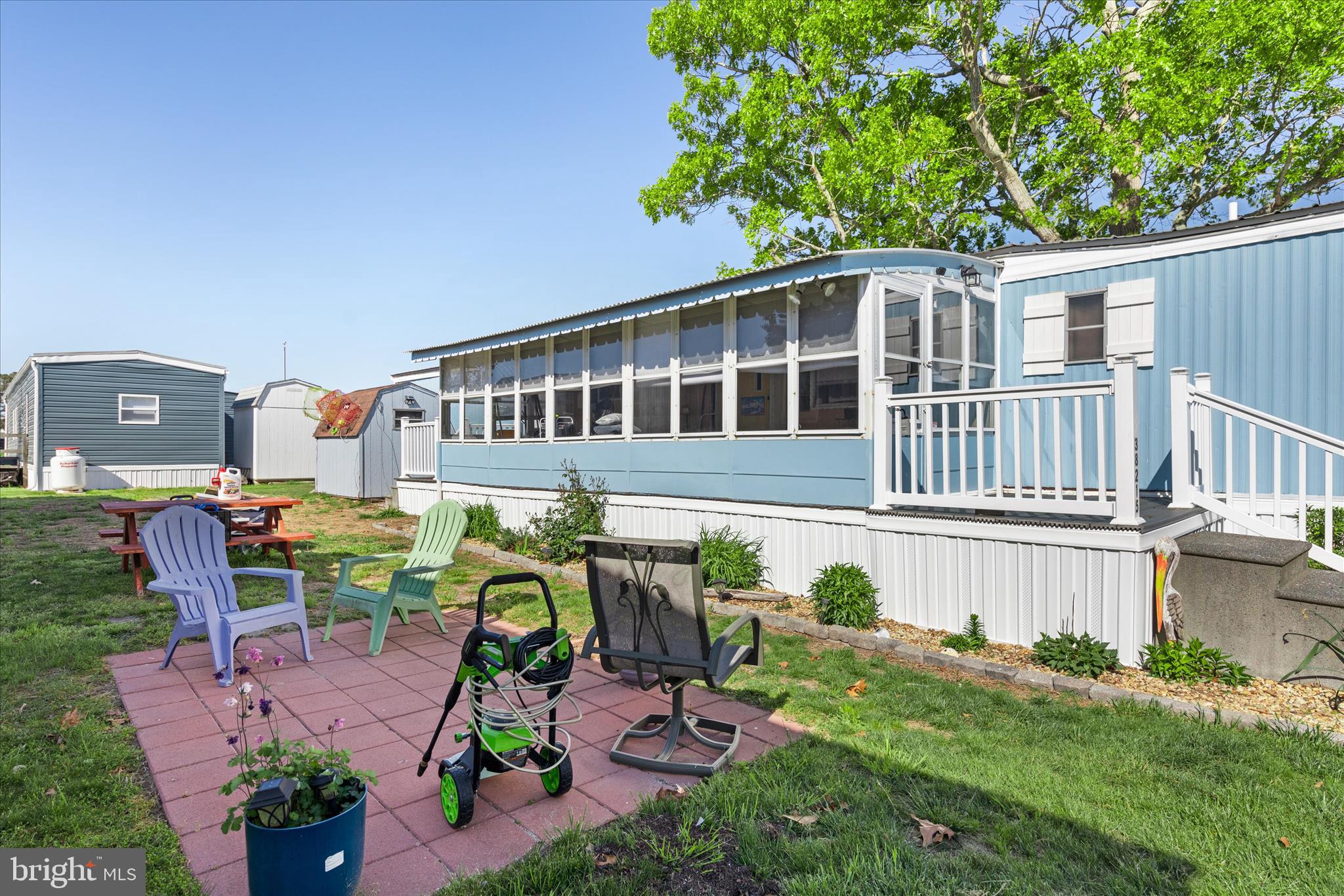 38215 Possum Road Ocean View, DE 19970 - Photo 3 of 26 a view of a house with backyard and sitting area