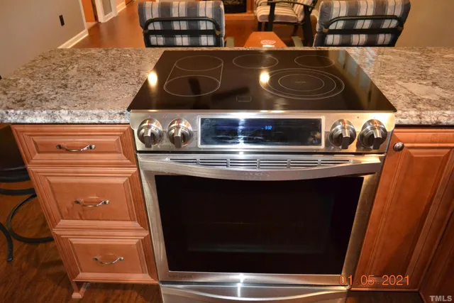 a close view of stove and microwave