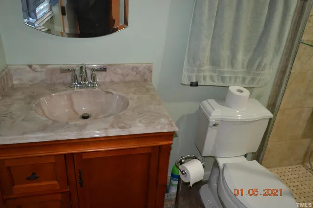 a bathroom with a sink and a toilet