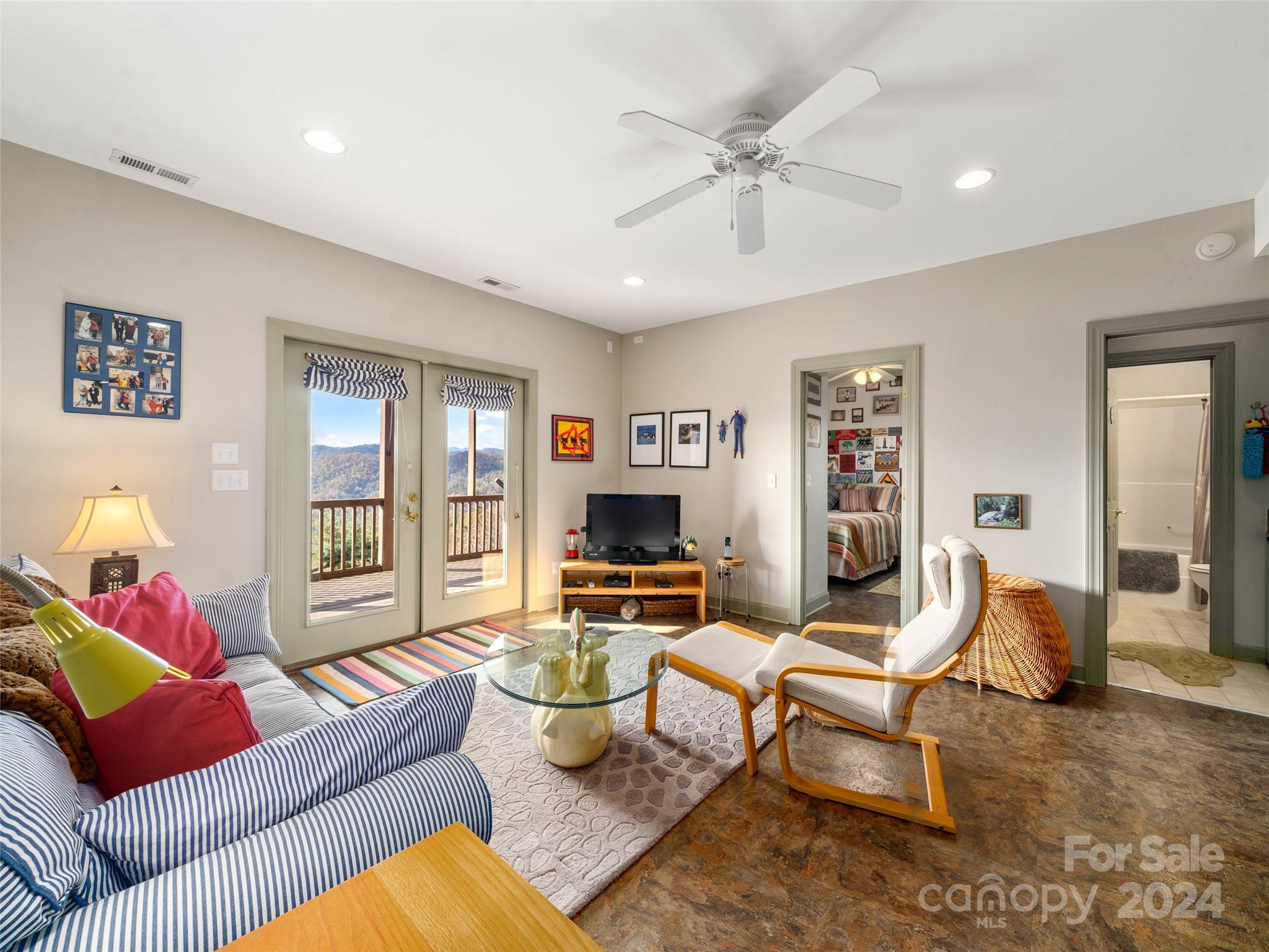 47 Ruffed Grouse Road Brevard, NC 28712 - Photo 32 of 48 a living room with furniture and a fireplace