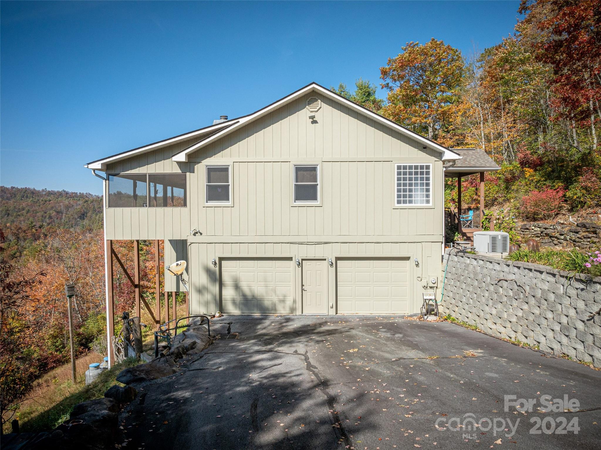 47 Ruffed Grouse Road Brevard, NC 28712 - Photo 7 of 48 a view of a house with a yard and garage