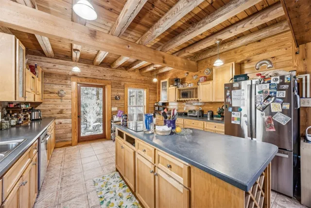 a bedroom with furniture and a rug