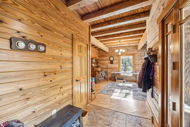 a kitchen with sink stove and wooden cabinets