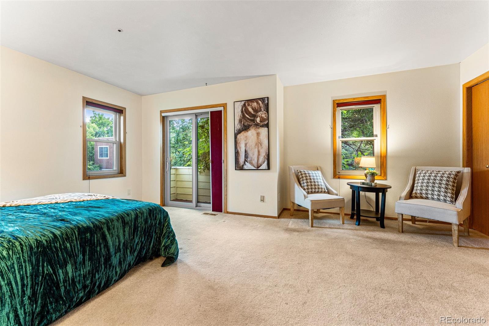 1343 Alpine Avenue Boulder, CO 80304 - Photo 22 of 39 a spacious bedroom with a bed and a window