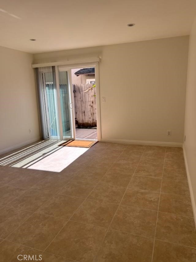 16642 Goldenwest Street Huntington Beach, CA 92647 - Photo 14 of 27 an empty room with windows