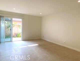 16642 Goldenwest Street Huntington Beach, CA 92647 - Photo 4 of 27 an empty room with windows