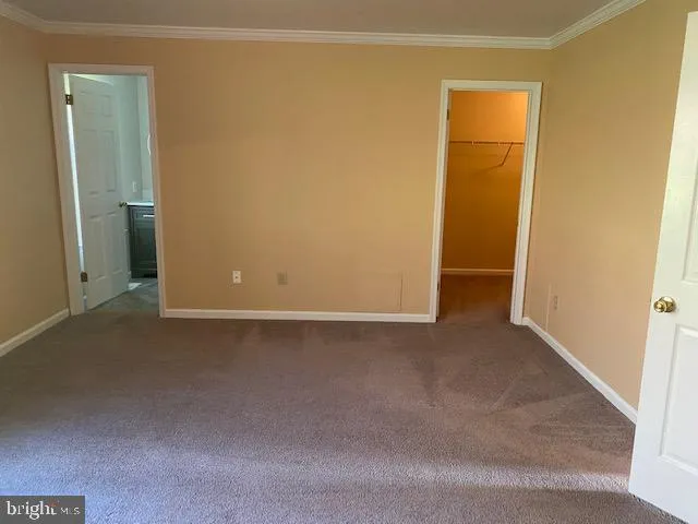an empty room with closet