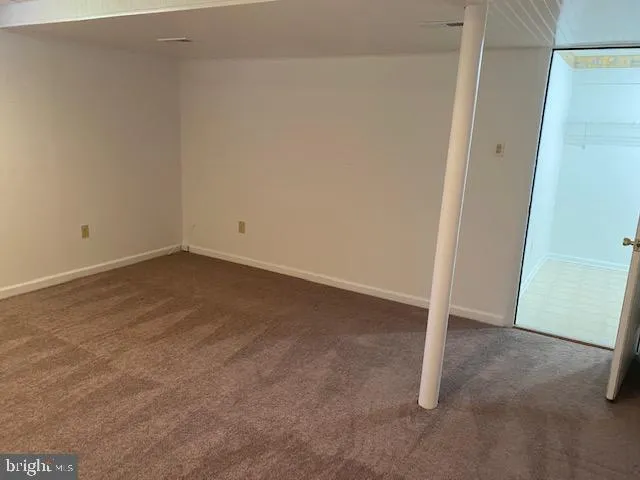 a room with water heater and storage