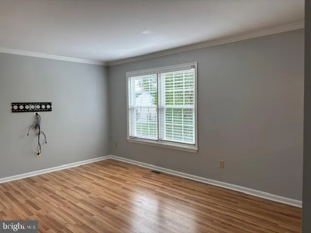 a view of a room with a window