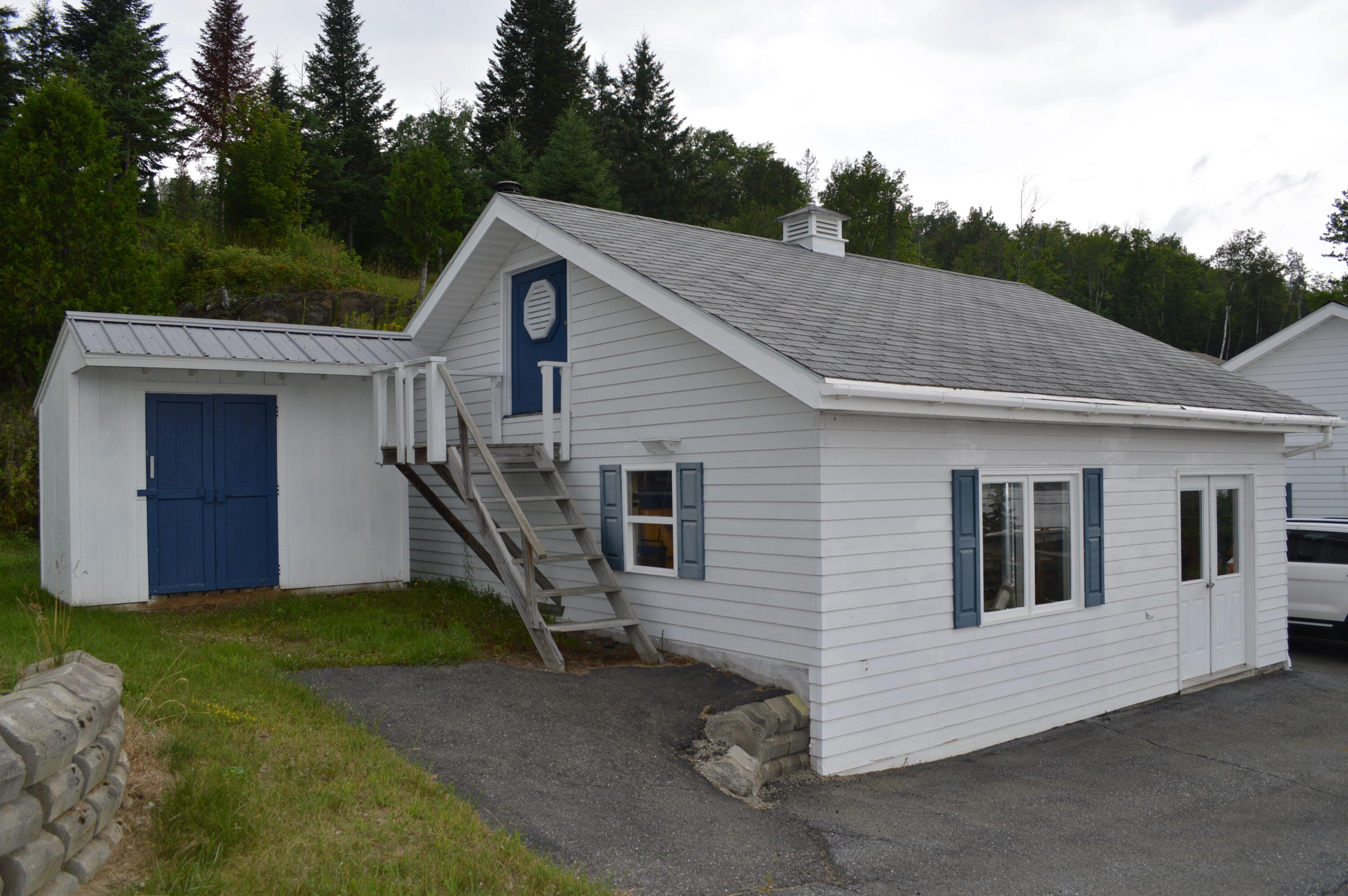 2589 Aroostook Road Eagle Lake, ME 04739 - Photo 11 of 65 Workshop with storage above and wood she
