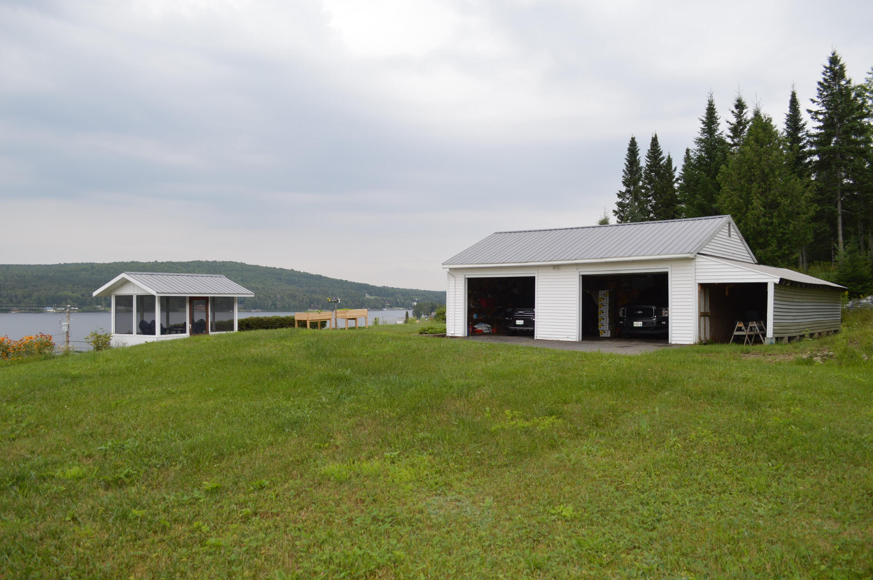 2589 Aroostook Road Eagle Lake, ME 04739 - Photo 15 of 65 2-car detached garage with lean-tos and
