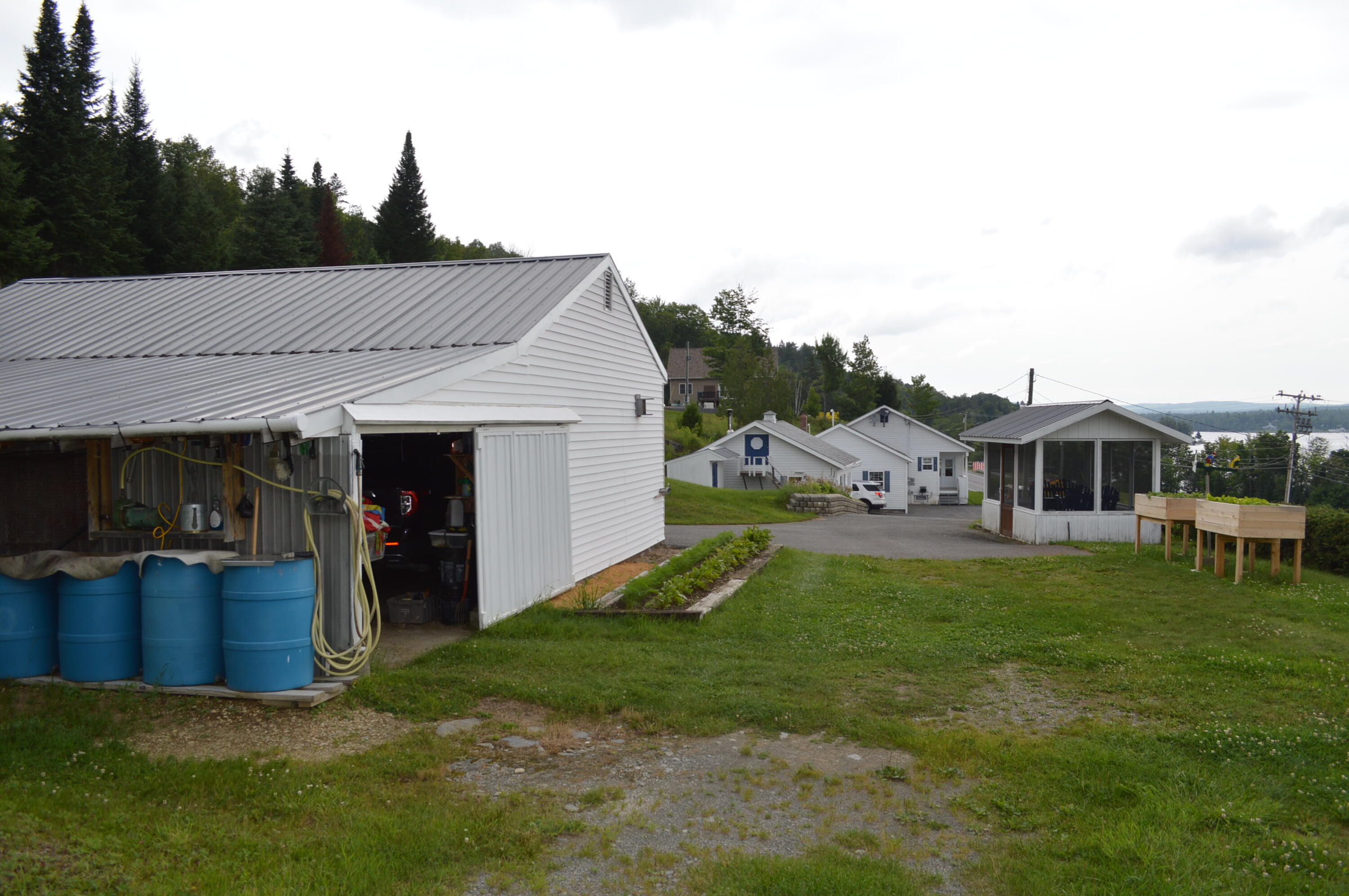 2589 Aroostook Road Eagle Lake, ME 04739 - Photo 20 of 65 View from back of 2-car garage with wate