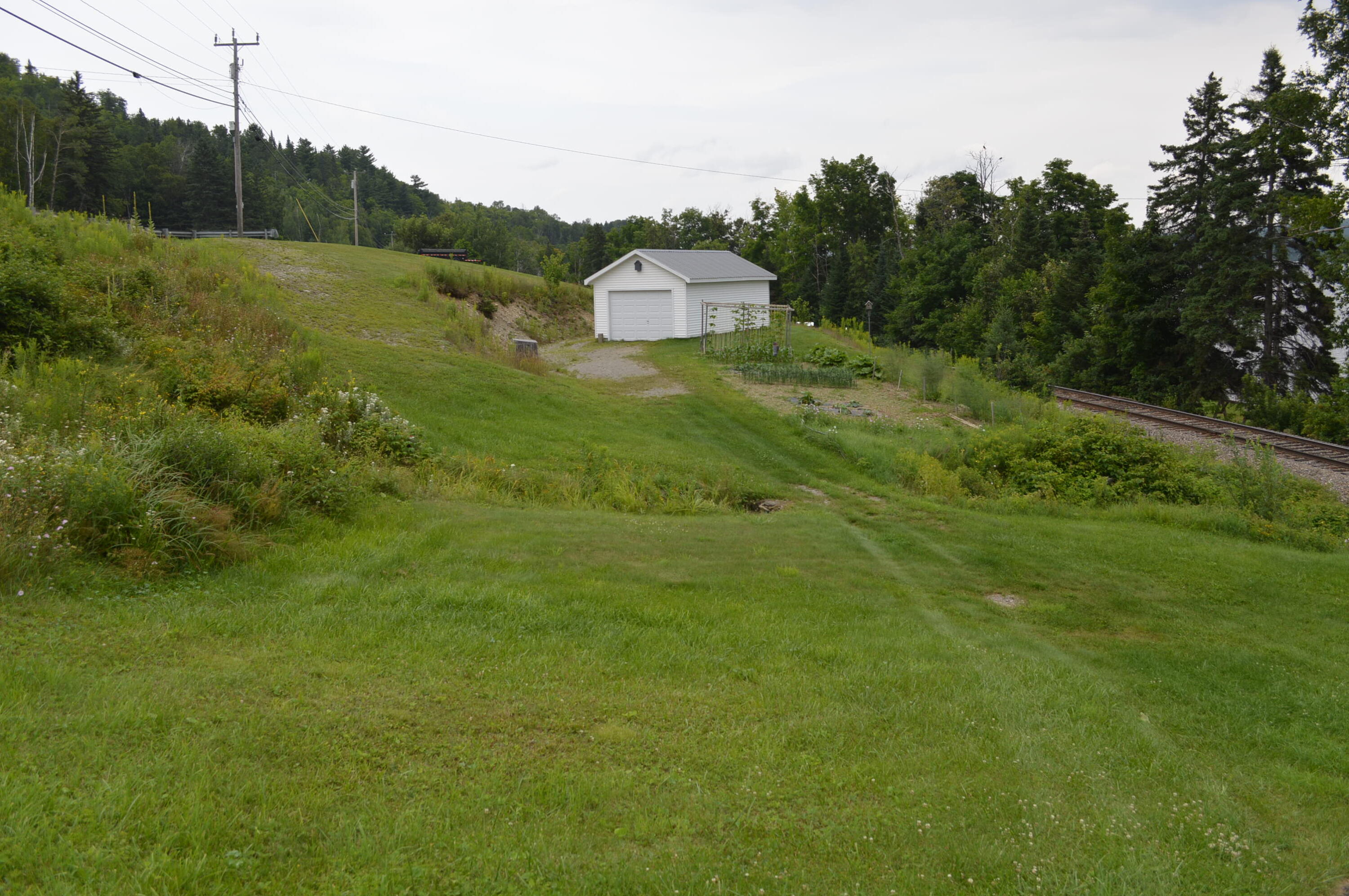 2589 Aroostook Road Eagle Lake, ME 04739 - Photo 31 of 65 Water side garage and gardens
