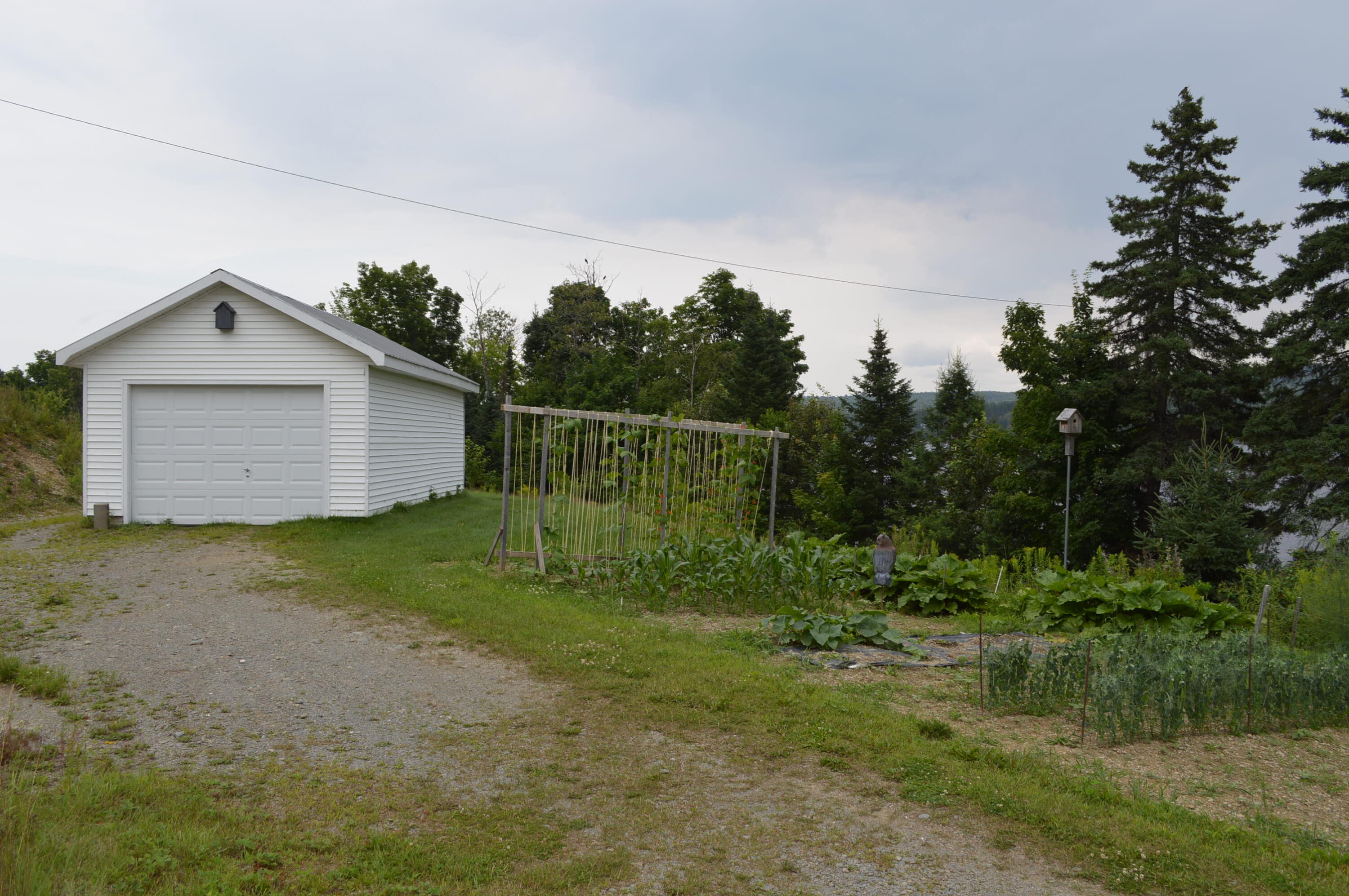 2589 Aroostook Road Eagle Lake, ME 04739 - Photo 32 of 65 Waterfront garage with gardens