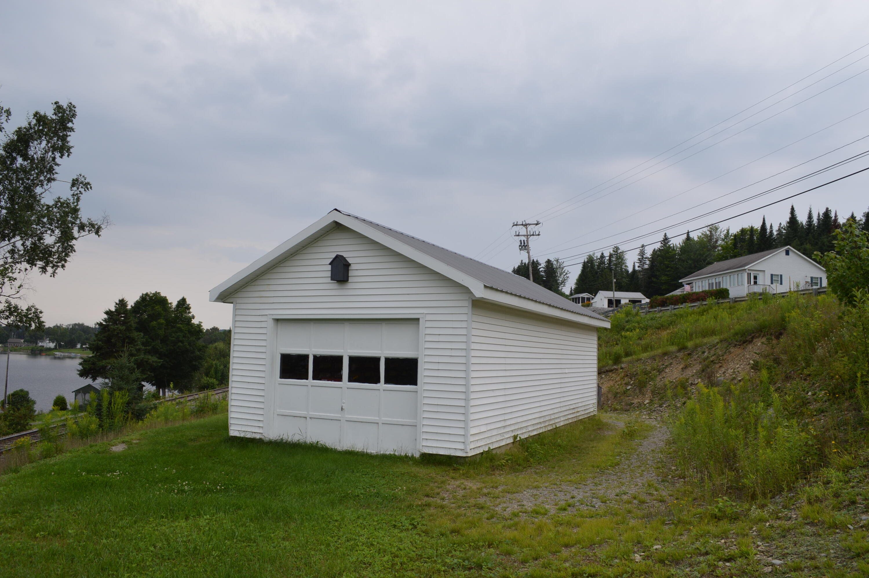 2589 Aroostook Road Eagle Lake, ME 04739 - Photo 33 of 65 Waterfront garage with house and gazebo