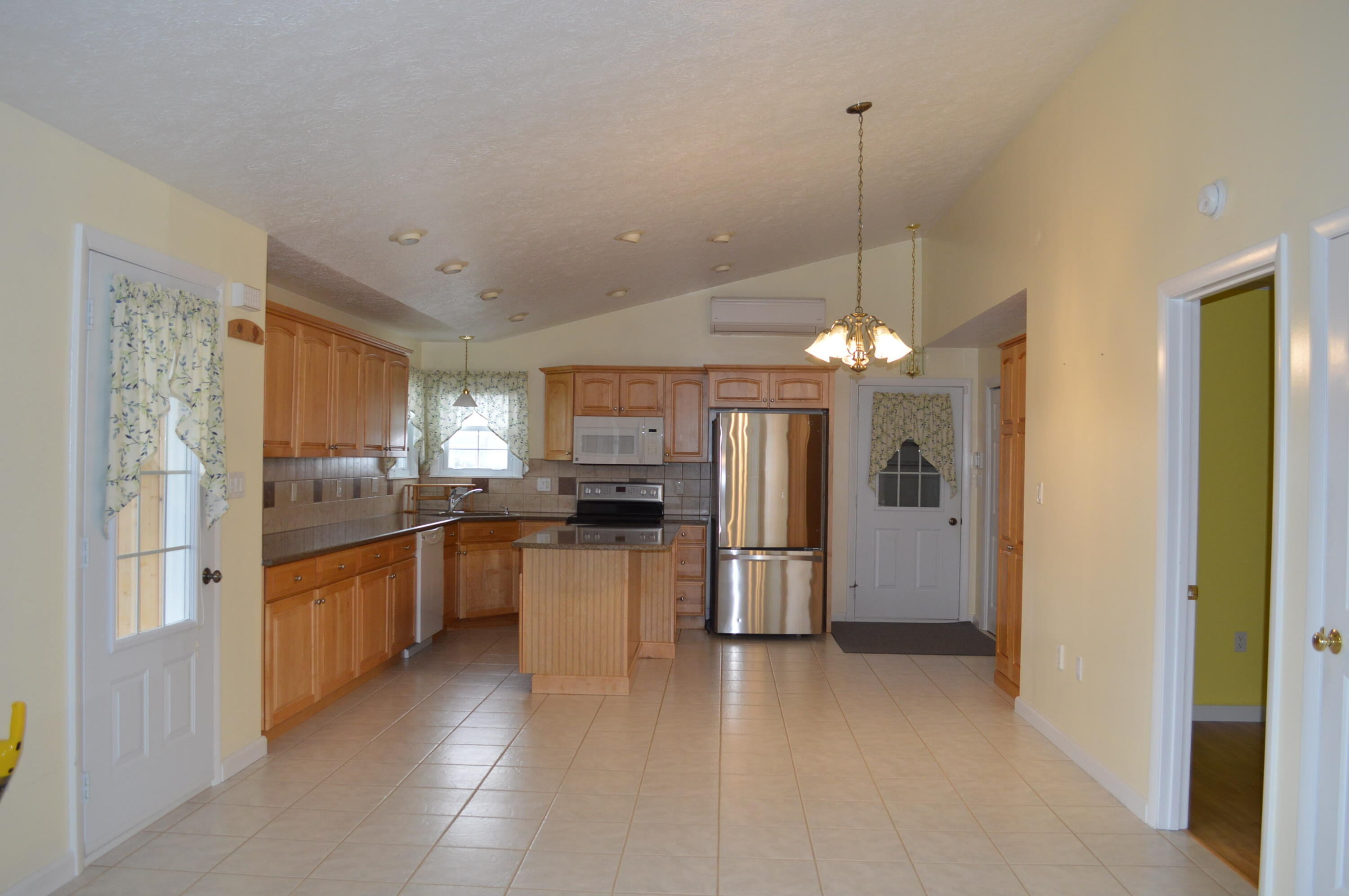 2589 Aroostook Road Eagle Lake, ME 04739 - Photo 46 of 65 Living room to Kitchen 1