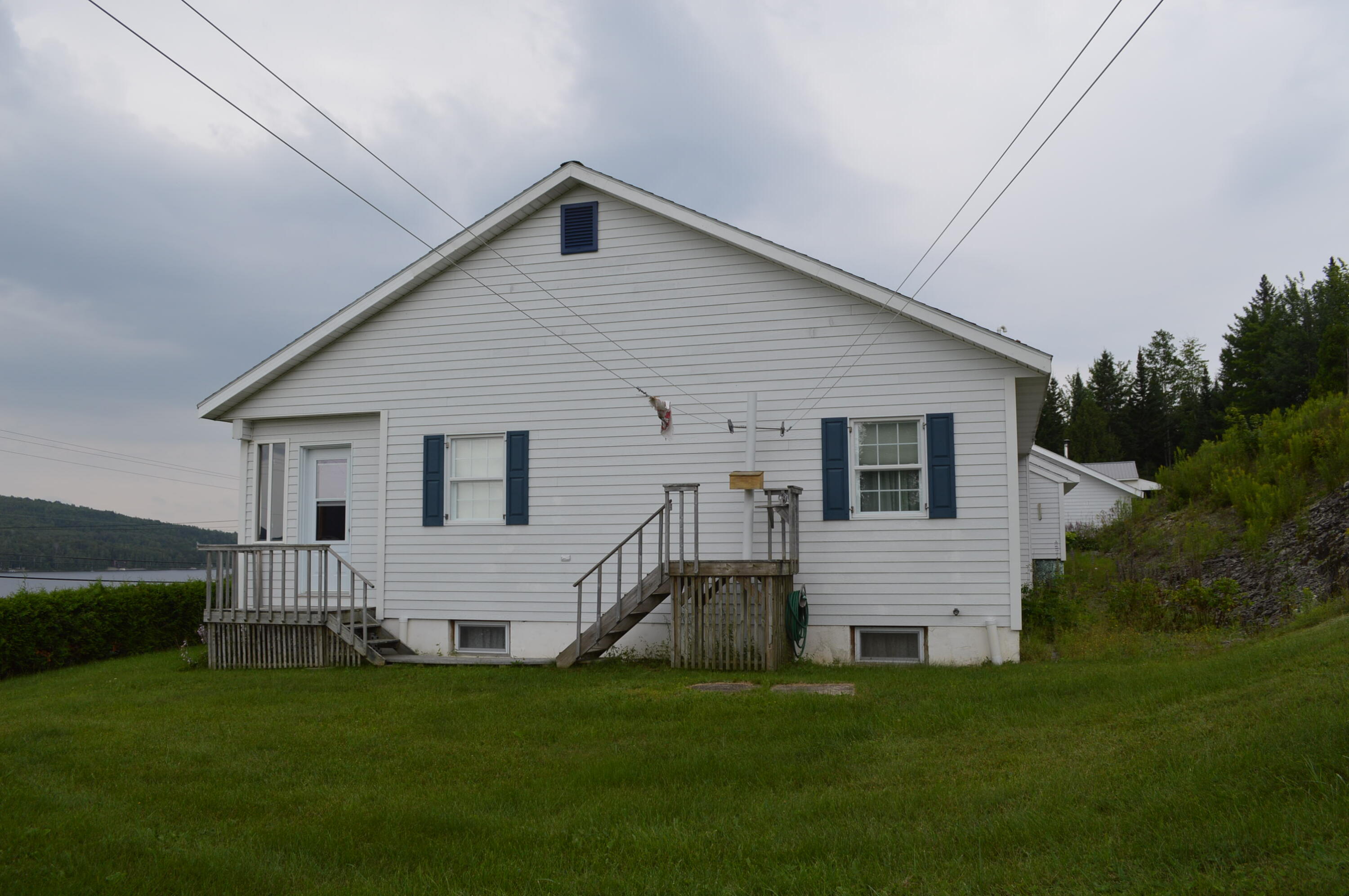 2589 Aroostook Road Eagle Lake, ME 04739 - Photo 9 of 65 House side with clotheslines
