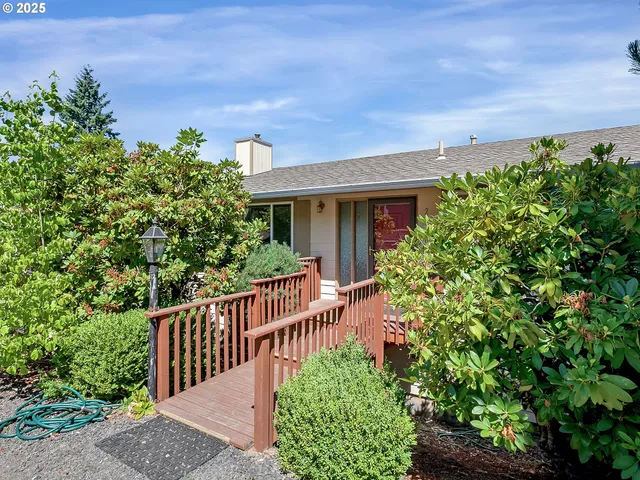 a house view with a garden space